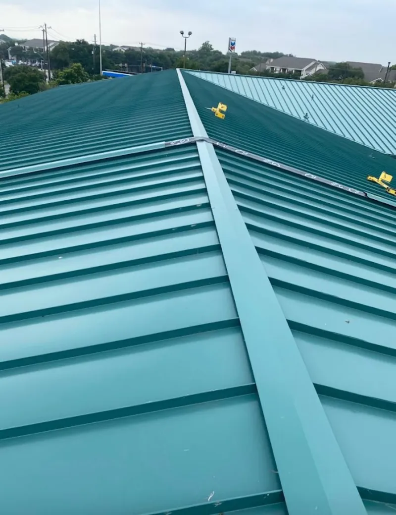 Green commercial metal roof ridge and valley for Metal Roof Repair in Salmon Creek